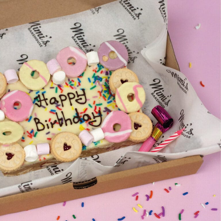 A Mimi's gift hamper packed with bakes, tea and treats